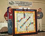 Jim Jenista and Will Shortz show off the Quilt