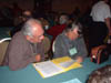Mel and Peggy Rosen review the contents of their folder Mel and Peggy Rosen review the contents of their folder