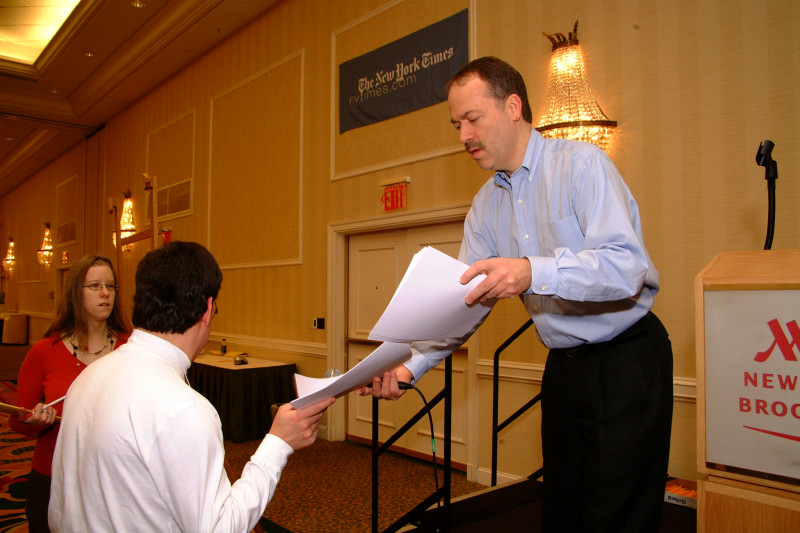 Will Shortz Handing Out Puzzles