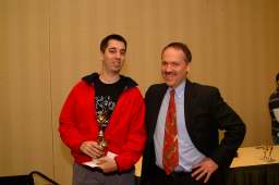 Trip Payne receiving trophies from Will Shortz Trip Payne receiving trophies from Will Shortz