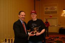 Will Shortz giving 1st prize trophy to Tyler Hinman Will Shortz giving 1st prize trophy to Tyler Hinman